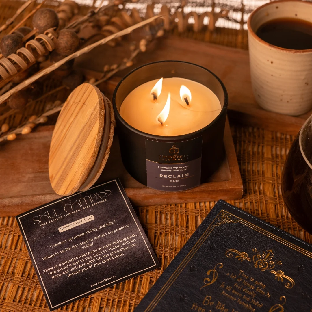 Woody oud scented candle Australia 2026 Gleam Haven luxury scented candle in dark amber vessel with warm fragrance notes