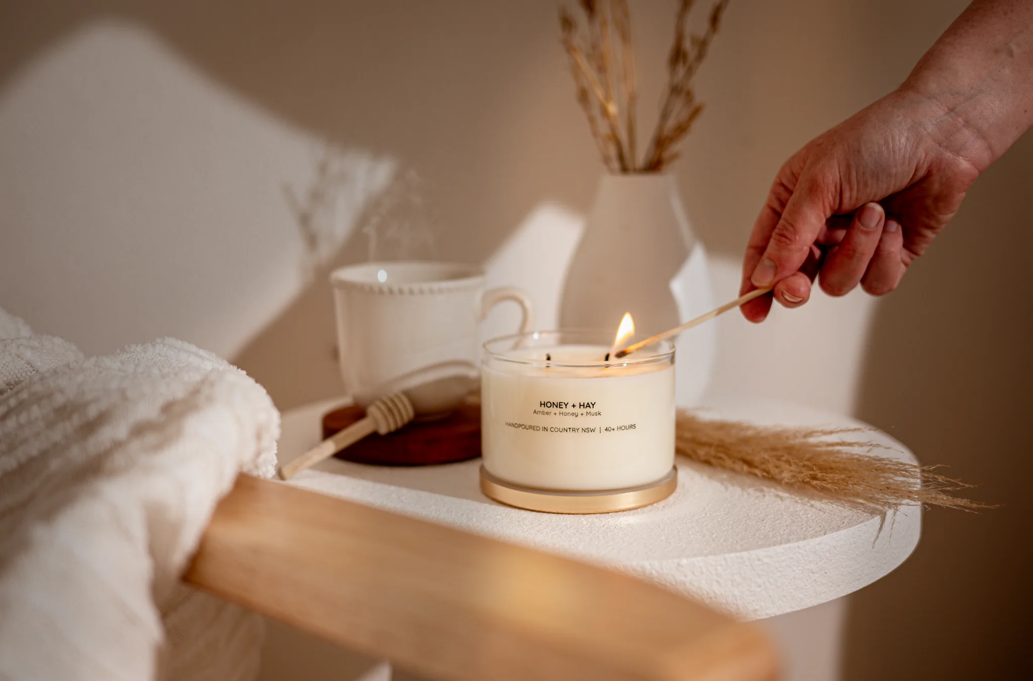 Scented candles online Australia  Gleam Haven luxury scented candle burning in an Australian home interior 2026