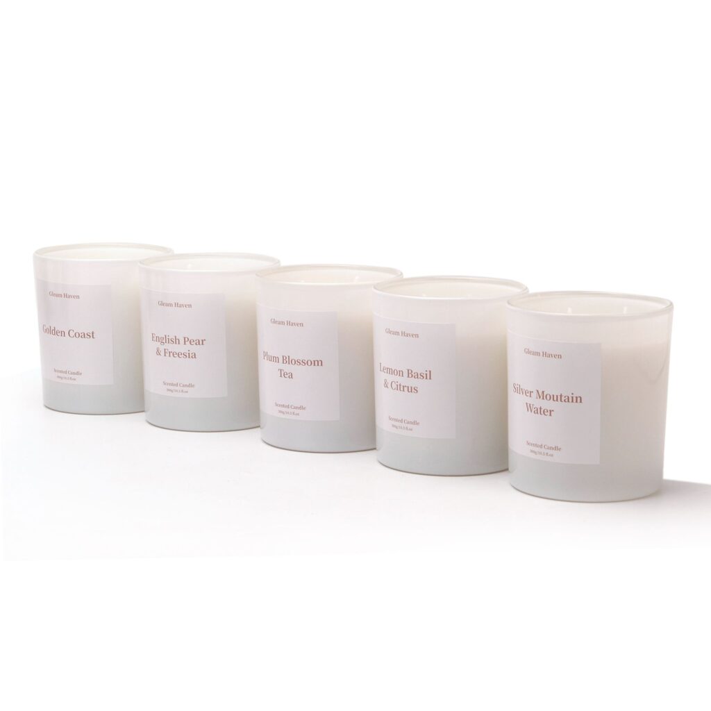 Gleam Haven hand-poured soy wax scented candle 200g matte black jar four variants flat lay